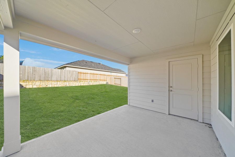 Exterior details and patio area of a home in Grand Pines, Magnolia (Image 3). Exterior details and patio area of a home in Grand Pines, Magnolia (Image 3).