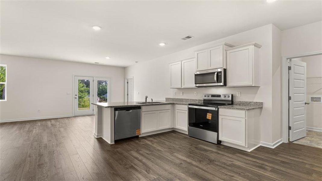 Furnished interior view inside a new home in Champion's Run, Lithonia (Image 13).