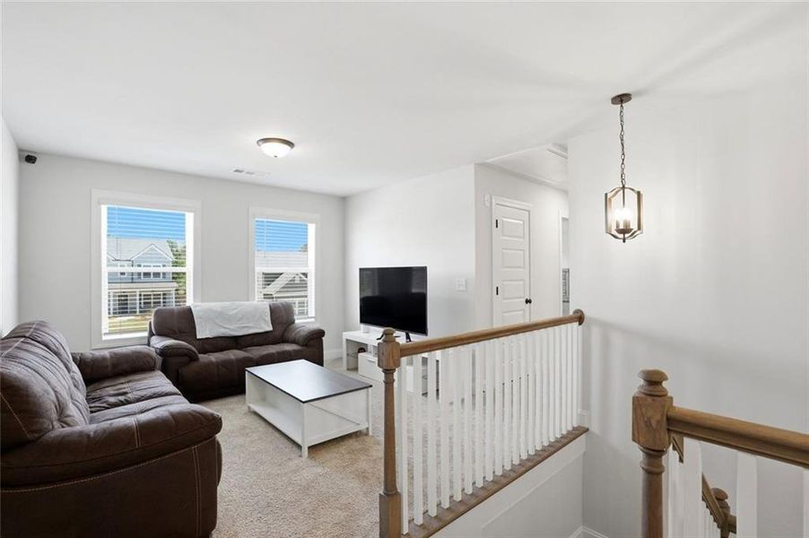 Furnished interior view inside a new home in Calgary Downs, Winder (Image 31).