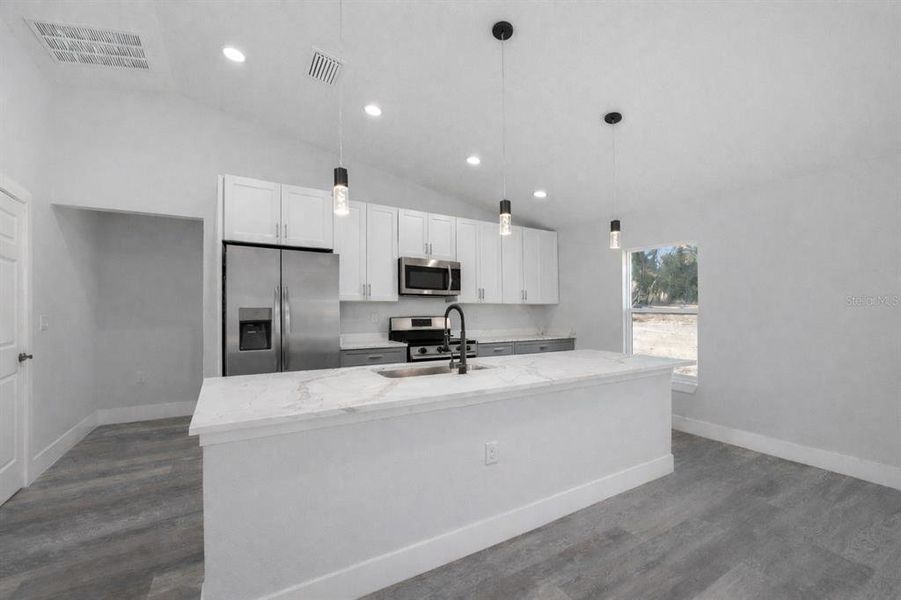 Furnished interior view inside a new home in , Dunnellon (Image 6).