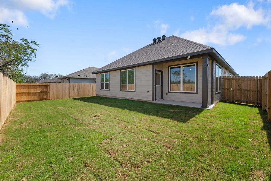 Exterior details and patio area of a home in The Reserve at Foxwood, Bryan (Image 3).
