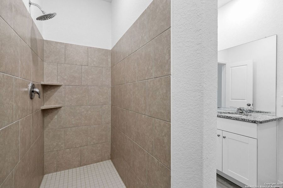 Furnished interior view inside a new home in Hidden Trails: Coastline Collection, Bulverde (Image 6).