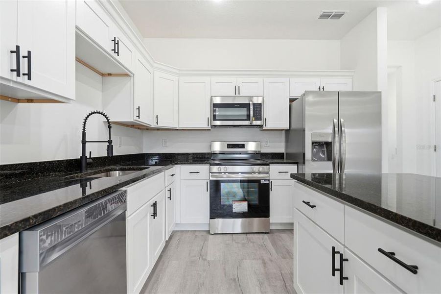 Furnished interior view inside a new home in , Haines City (Image 13).
