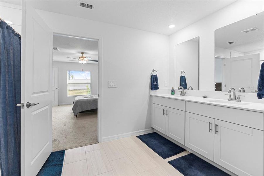 Furnished interior view inside a new home in North Park Isle: The Estates II, Plant City (Image 14). Furnished interior view inside a new home in North Park Isle: The Estates II, Plant City (Image 14).