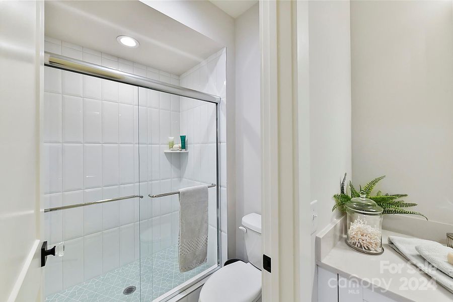 Actual home has walk-in shower