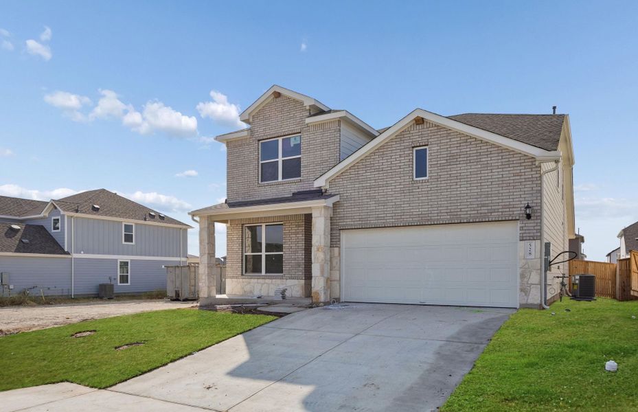 Front exterior of a new home in Patterson Ranch, Georgetown, TX, highlighting curb appeal (Image 17).