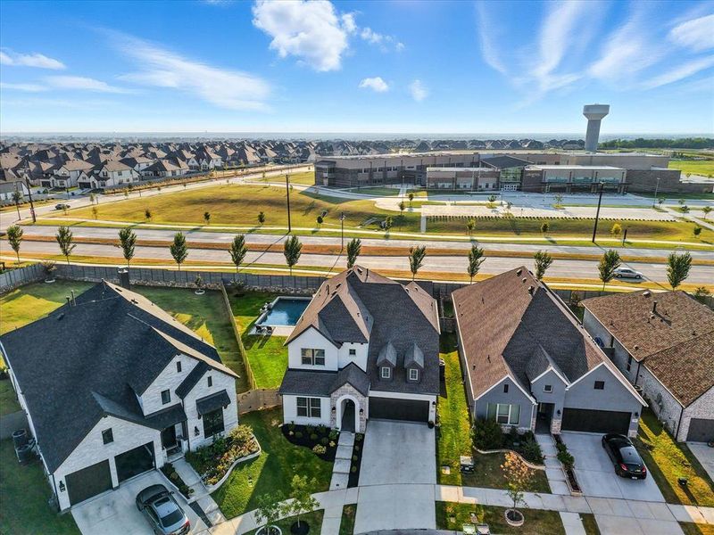 Front exterior of a new home in , Argyle, TX, highlighting curb appeal (Image 21). Front exterior of a new home in , Argyle, TX, highlighting curb appeal (Image 21).