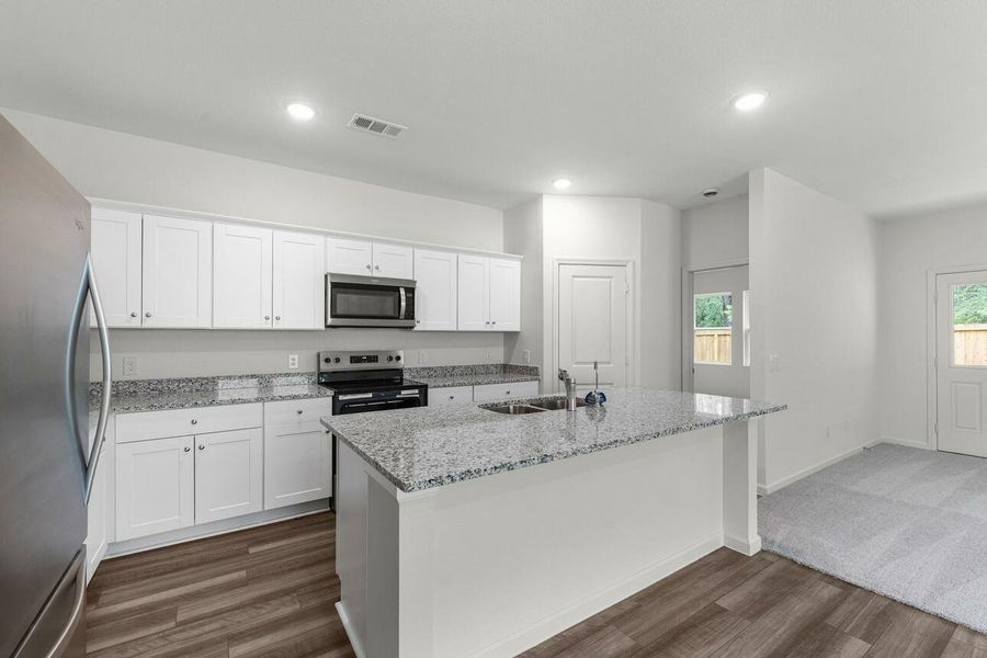 Furnished interior view inside a new home in Cedar Pointe, Crosby (Image 10).