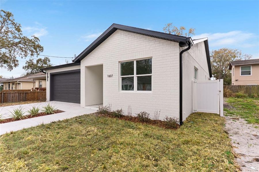 Exterior details and patio area of a home in , Tampa (Image 18). Exterior details and patio area of a home in , Tampa (Image 18).