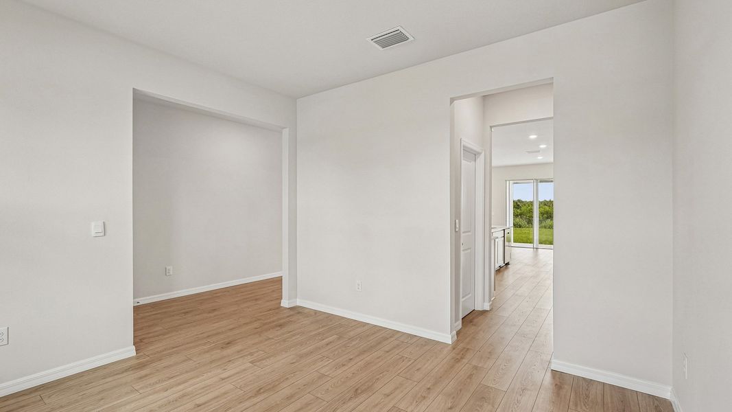 Representative unfurnished interior of a home built from the Hemingway by D.R. Horton in Silverstone North, Palmetto (Image 14).