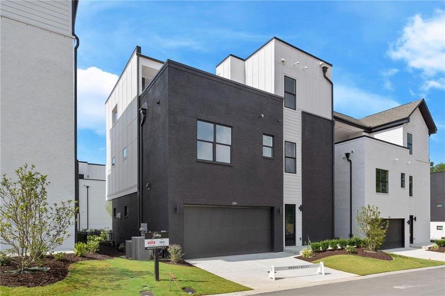 Front exterior of a new home in The Gathering – Alpharetta, Alpharetta, GA, highlighting curb appeal (Image 24).