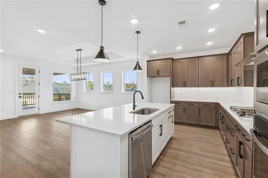 Furnished interior view inside a new home in Crescent Pointe at Great Sky, Canton (Image 7).