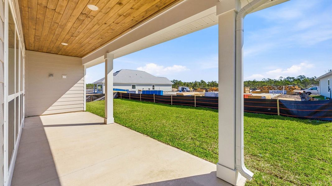 Exterior details and patio area of a home in WindMark Beach, Port Saint Joe (Image 3).