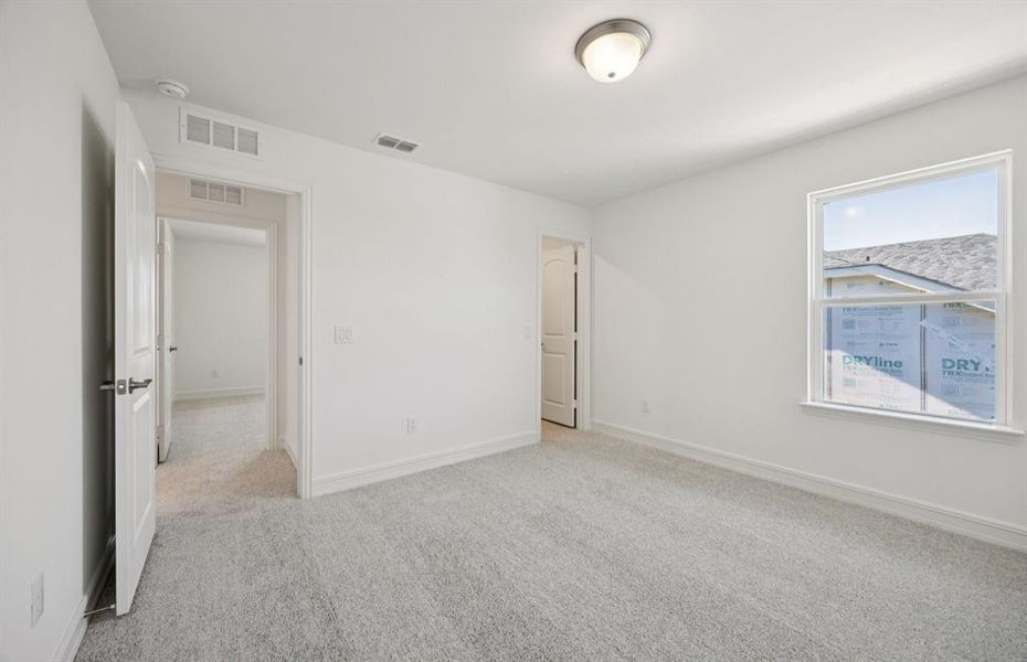 Spacious secondary bedroom *real home pictured