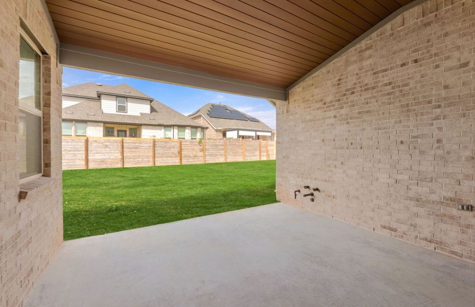 Exterior details and patio area of a home in Bluffview Reserve, Leander (Image 4).