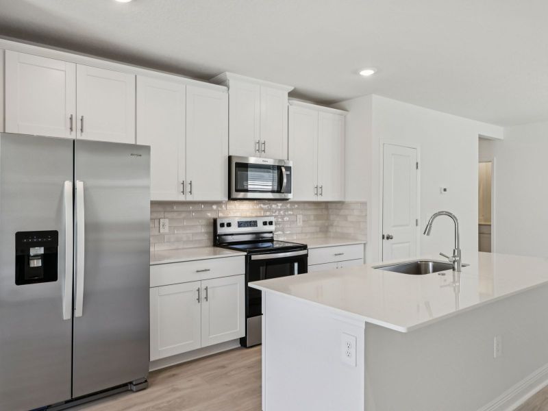 Furnished interior view inside a new home in Villamar - Classic Series, Winter Haven (Image 3).