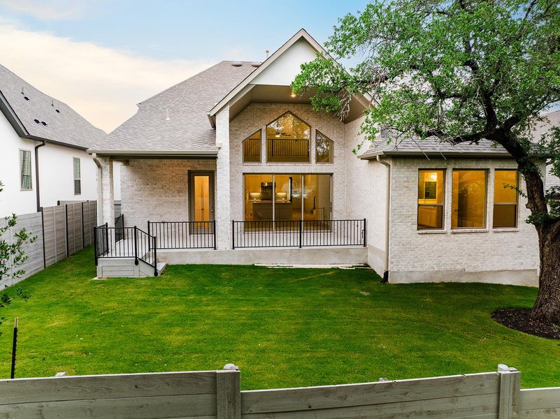 Front exterior of a new home in Wolf Ranch South Fork, Georgetown, TX, highlighting curb appeal (Image 20). Front exterior of a new home in Wolf Ranch South Fork, Georgetown, TX, highlighting curb appeal (Image 20).