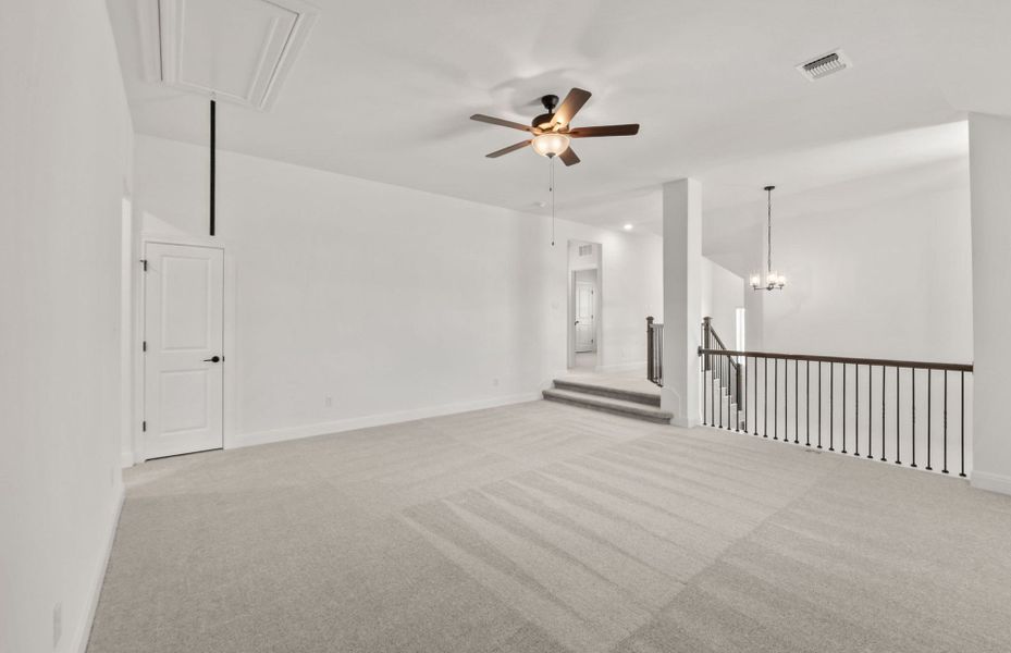 Representative unfurnished interior of a home built from the Wallace by Pulte Homes in Bluffview Reserve, Leander (Image 17).