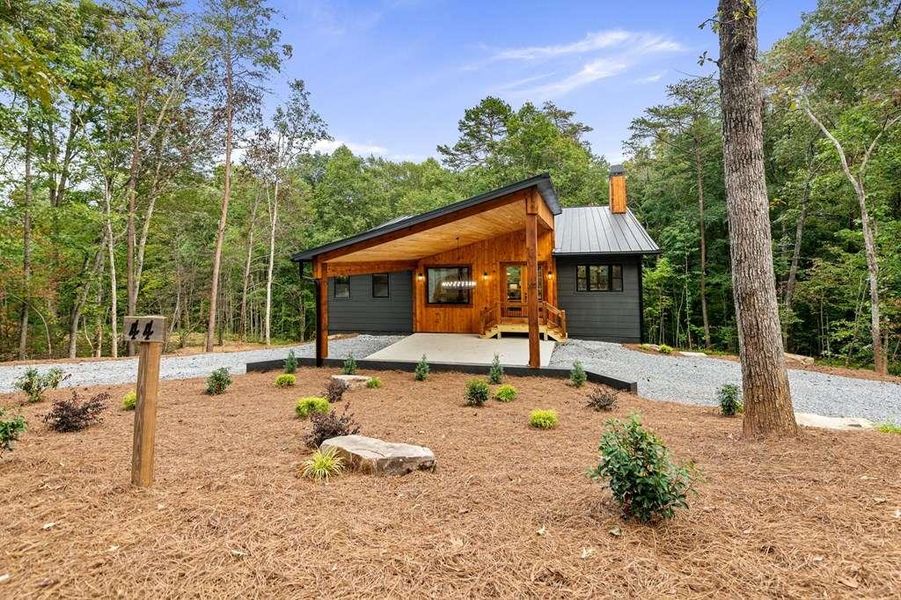 Front exterior of a new home in , McCaysville, GA, highlighting curb appeal (Image 2).