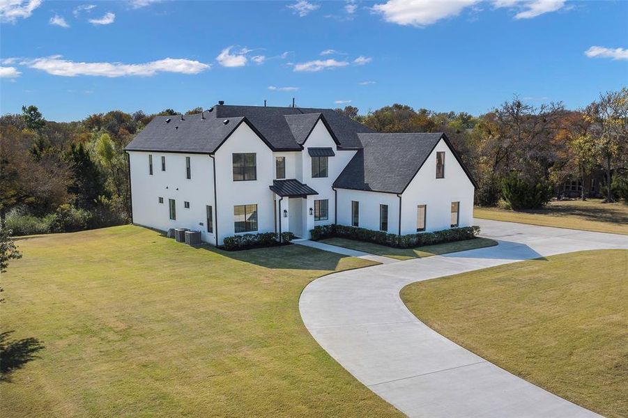 Front exterior of a new home in , McKinney, TX, highlighting curb appeal (Image 21). Front exterior of a new home in , McKinney, TX, highlighting curb appeal (Image 21).