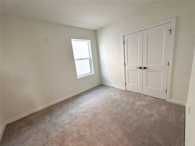 Spacious, unfurnished interior of a new home in Grasslands West, Lakeland (Image 17).