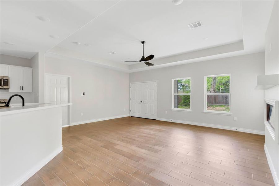 Large family room open to the kitchen.