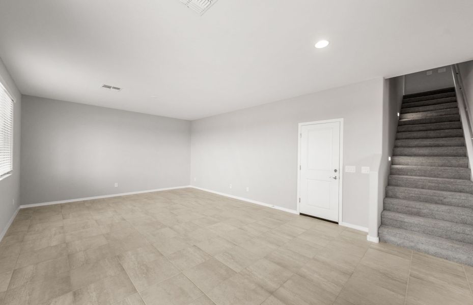 Spacious, unfurnished interior of a new home in Asante- Atrium Series, Surprise (Image 17).