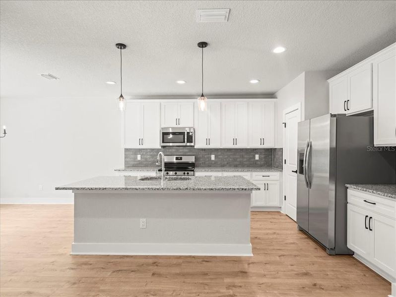 Furnished interior view inside a new home in , Weeki Wachee (Image 5).
