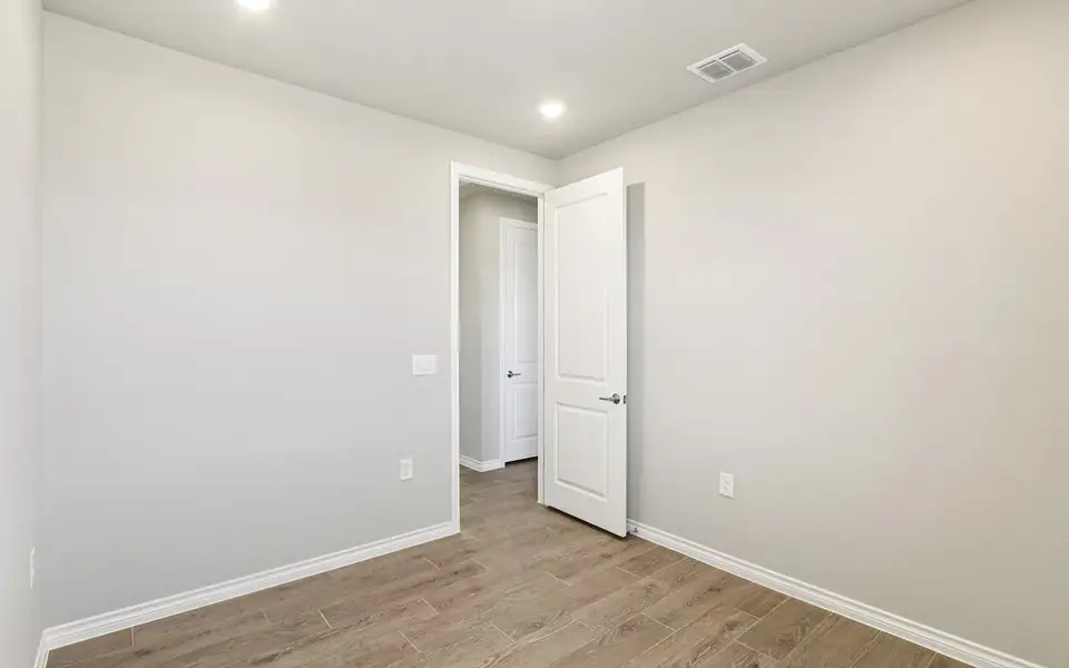 Spacious, unfurnished interior of a new home in Cottage at Kissing Tree, San Marcos (Image 7).