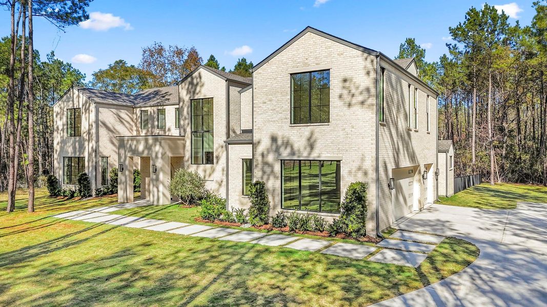 Front exterior of a new home in , Montgomery, TX, highlighting curb appeal (Image 1). Front exterior of a new home in , Montgomery, TX, highlighting curb appeal (Image 1).