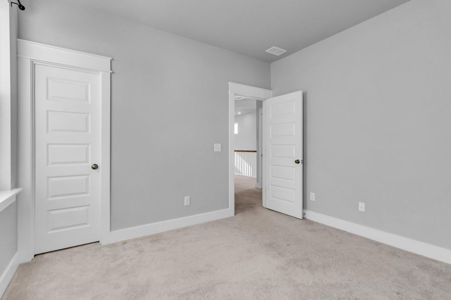 Spacious, unfurnished interior of a new home in Carnes Crossroads: Row Collection, Summerville (Image 25). Spacious, unfurnished interior of a new home in Carnes Crossroads: Row Collection, Summerville (Image 25).