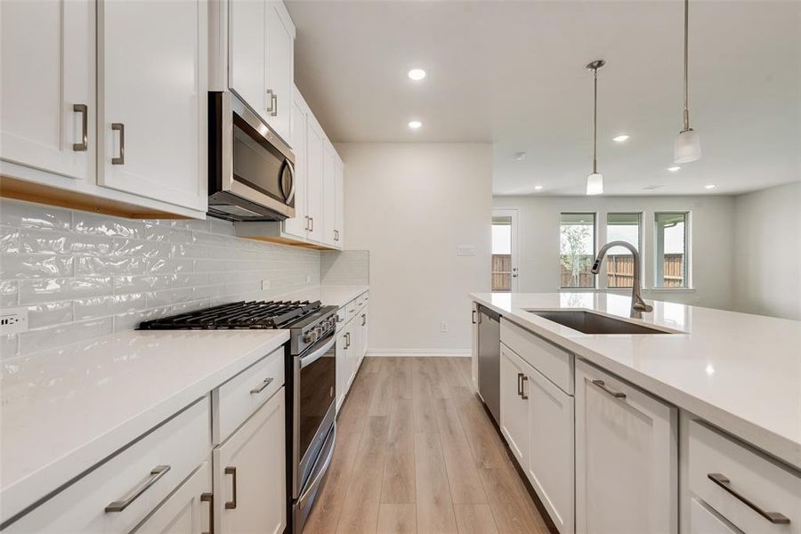 Furnished interior view inside a new home in Spiritas Ranch, Little Elm (Image 4). Furnished interior view inside a new home in Spiritas Ranch, Little Elm (Image 4).