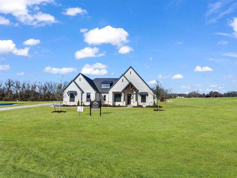 Front exterior of a new home in , Weatherford, TX, highlighting curb appeal (Image 25). Front exterior of a new home in , Weatherford, TX, highlighting curb appeal (Image 25).