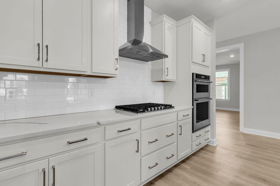 Furnished interior view inside a new home in Tidewater at Lakes of Cane Bay, Summerville (Image 6).