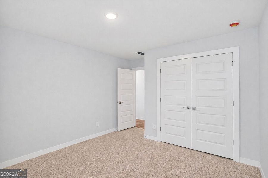 Spacious, unfurnished interior of a new home in The Fairways at Mirror Lake, Villa Rica (Image 48). Spacious, unfurnished interior of a new home in The Fairways at Mirror Lake, Villa Rica (Image 48).