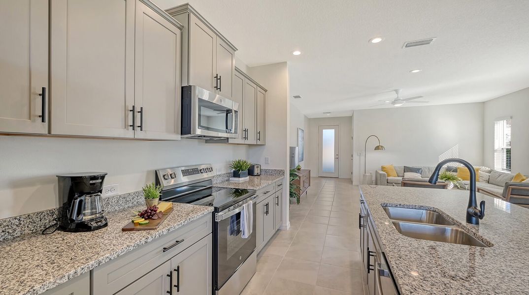 Furnished interior view inside a new home in SkySail, Naples (Image 8).