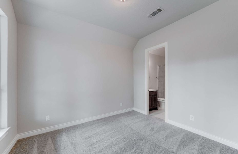 Representative unfurnished interior of a home built from the 3049 by Ravenna Homes in The Woodlands Hills 65′, Willis (Image 36). Representative unfurnished interior of a home built from the 3049 by Ravenna Homes in The Woodlands Hills 65′, Willis (Image 36).
