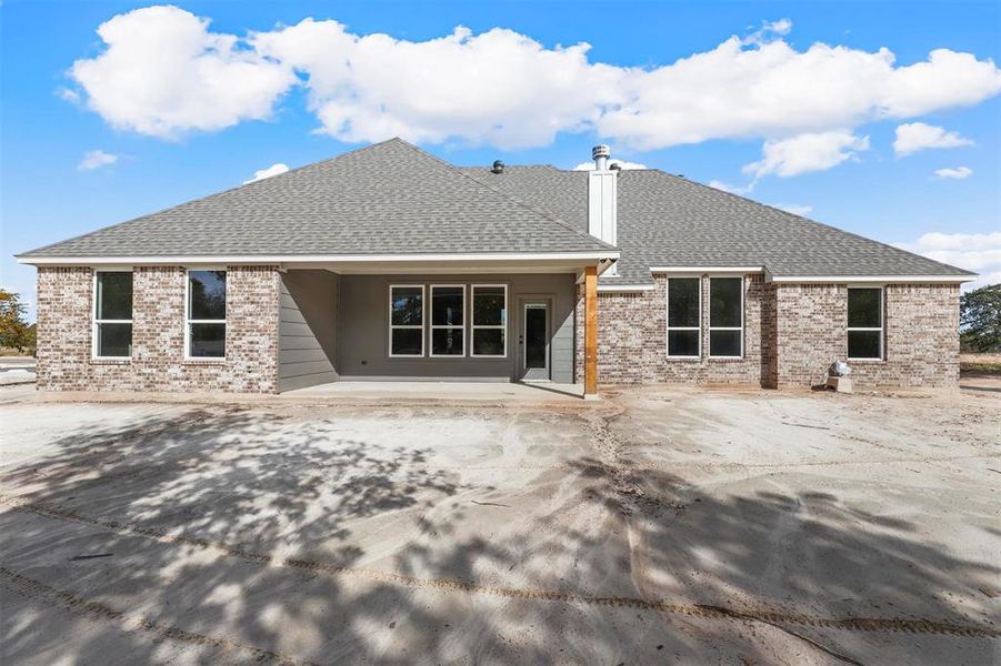 Back of property featuring a patio