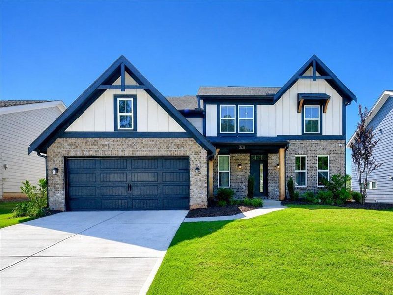 Front exterior of a new home in The Reserve At Liberty Park, Braselton, GA, highlighting curb appeal (Image 26).