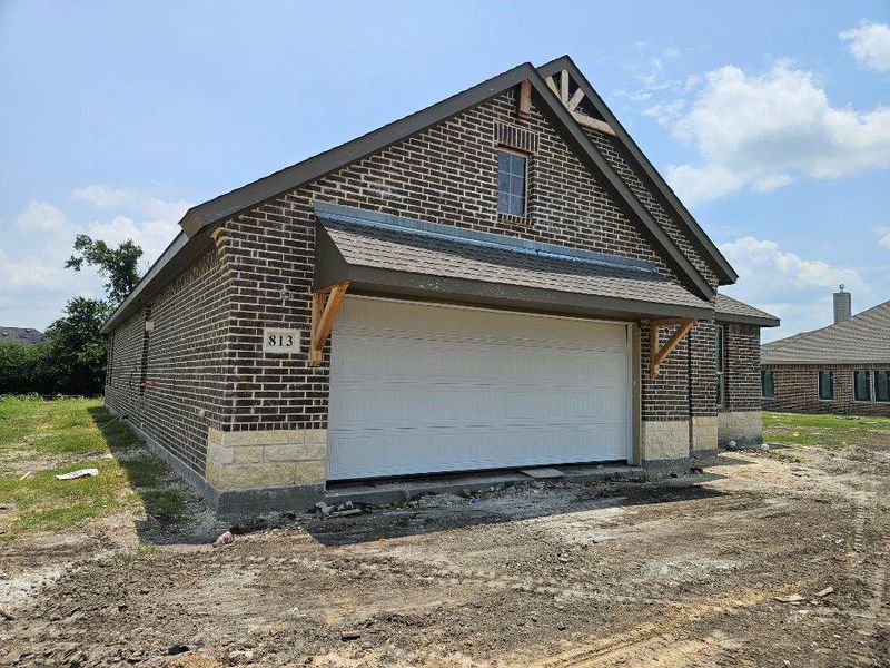 In-progress construction of a new home in The Hollow, Ennis, TX (Image 11).