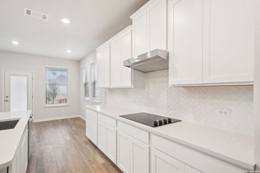 Furnished interior view inside a new home in Estancia Ranch - Classic Series, San Antonio (Image 17).