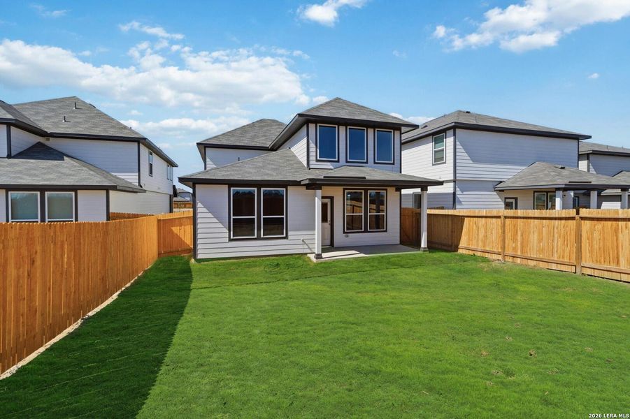Exterior details and patio area of a home in Red Hawk Landing, San Antonio (Image 4).