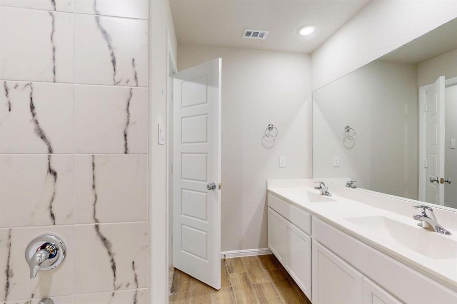Furnished interior view inside a new home in Prairie Ridge at Goodland, Venus (Image 14).