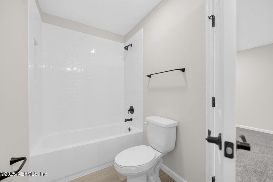 Furnished interior view inside a new home in , Jacksonville (Image 13).