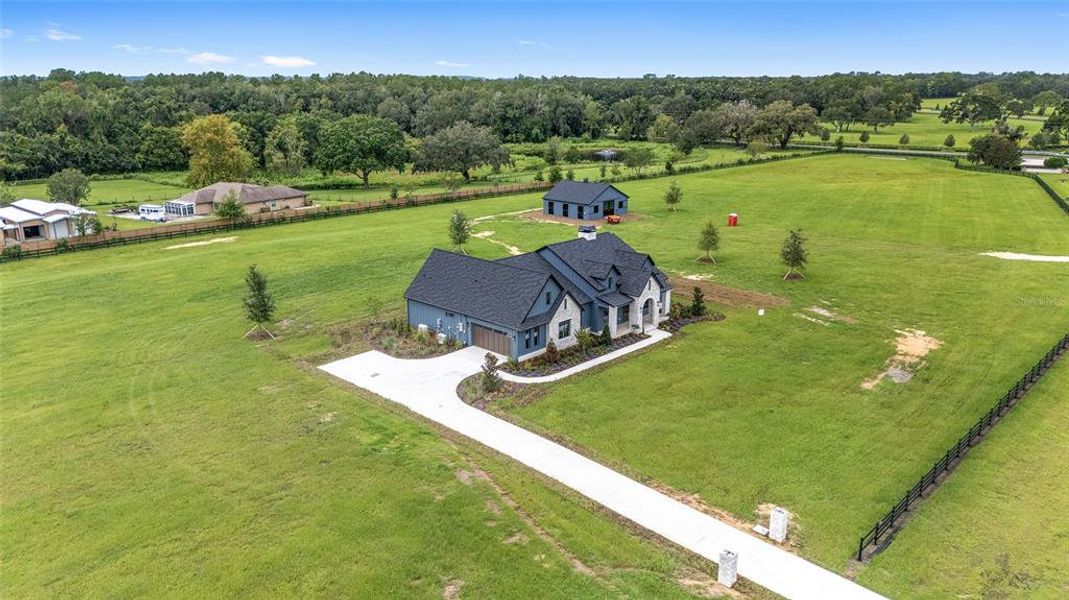 Front exterior of a new home in , Ocala, FL, highlighting curb appeal (Image 26).