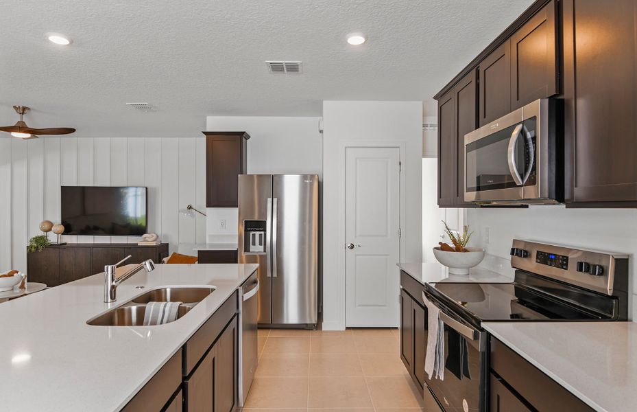Furnished interior view inside a new home in Riversong, Parrish (Image 13).
