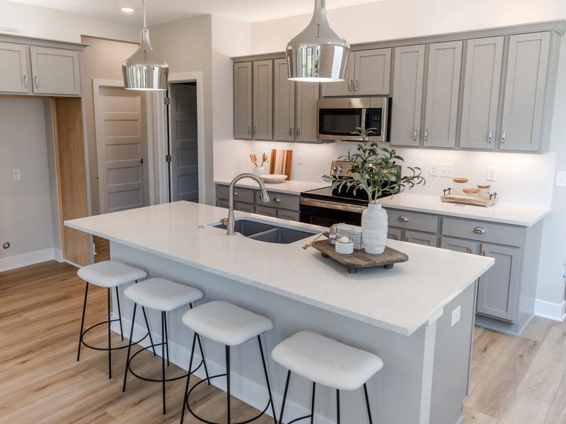 Representative furnished interior of a home built from the Ironwood by Perfection Builders in Heritage Commons, Andover (Image 3).