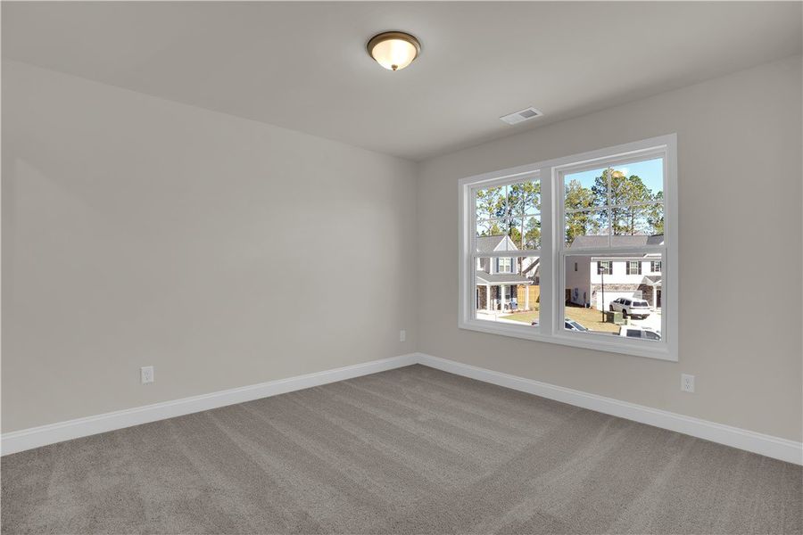 This airy bedroom offers a tranquil retreat with p This airy bedroom offers a tranquil retreat with p