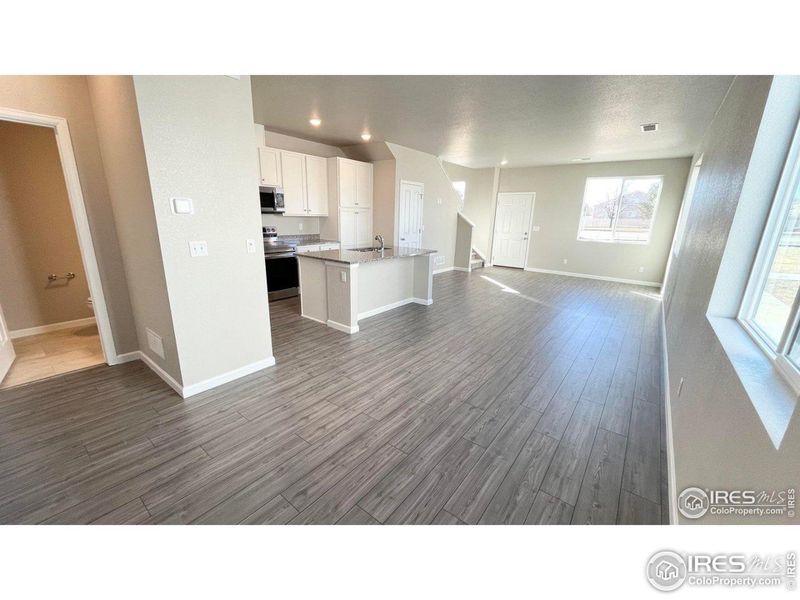 Spacious great room with tons of natural light Spacious great room with tons of natural light