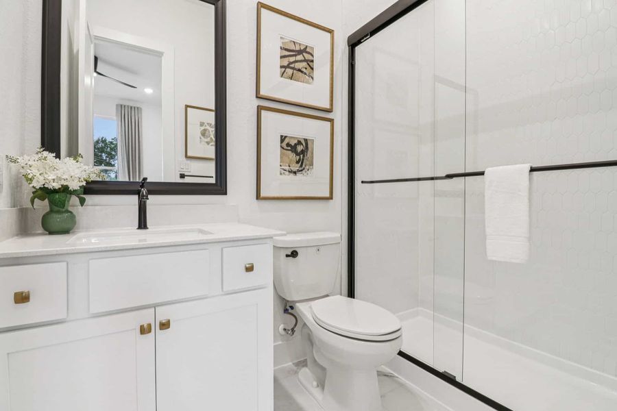 Representative furnished interior of a home built from the Lauren – 55′ Lot by Chesmar Homes in Attwater, Waller (Image 18).